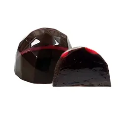 Bombón FRAMBUESA. Ganache de chocolate negro Caraibe 66% que combina perfectamente con la frescura y acidez de las frambuesas, creando una explosión de sabor en cada bocado.