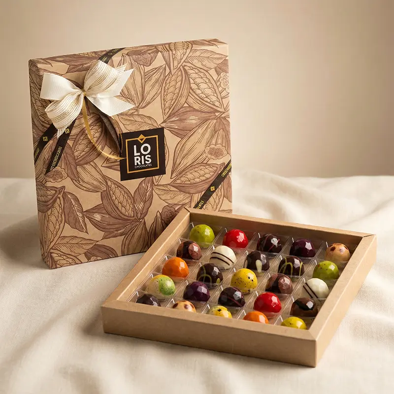 Caja 25 bombones artesanos creados en pequeñas tandas con los mejores ingredientes naturales, orgánicos y de comercio justo, sin lactosa, sin gluten.